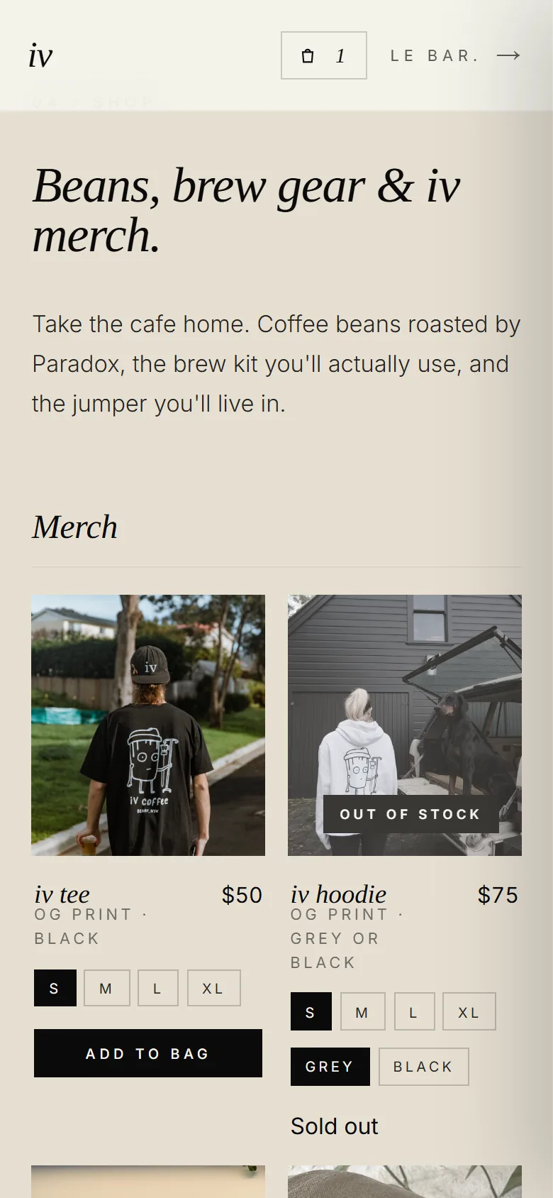 The iv coffee shop on a phone, showing a tee with size buttons and a hoodie marked out of stock.